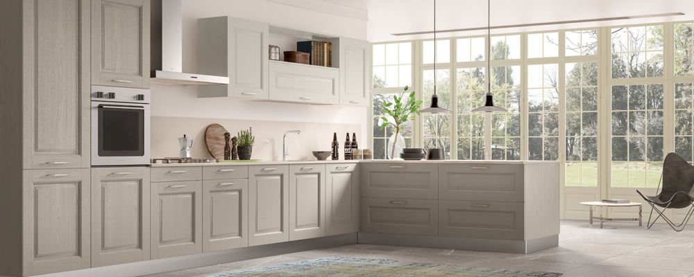 Tủ bếp chữ L với màu trắng sữa có vân gỗ tự nhiên tạo nên sự thanh lịch và tinh tế nhất cho không gian nhà bếp của bạn