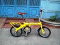 Xe đạp thể thao Peugeot gấp khung nhôm màu vàng