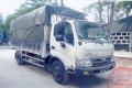 Xe tải Hino thùng mui bạt, model WU342L-NKMTJD3, tải trọng 4,95 tấn, thùng dài 4,3m