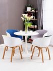 Bộ bàn ăn tròn 1m Tulip và 4 ghế Hay thân nhựa nệm vải - Modern