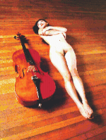 Tranh Thêu Chữ Thập Cô Gái Nằm Bên Chiếc Đàn Cello Đỏ