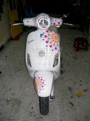 Dán decal xe Vespa Lx pháo hoa