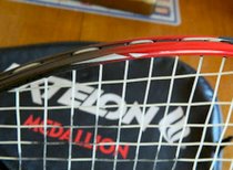 Ektelon Medallion. Racquetball Racquet with cover. Silver and Black.