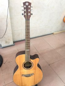 Đàn guitar acoustic Cẩm ấn dáng A