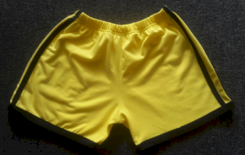 Quần thể dục mầm non | Mặt trước | Màu sắc: vàng cúc phối đen | Chất liệu: vải cotton 65/35